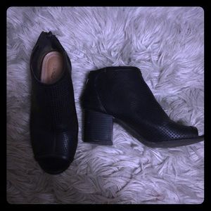 Black peep toe booties. Zippier in back.